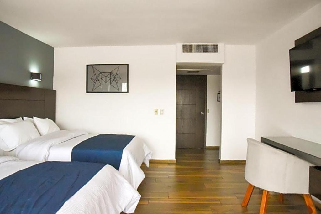 Hotel Portonovo Plaza Expo Zapopan Bagian luar foto