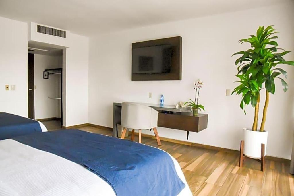 Hotel Portonovo Plaza Expo Zapopan Bagian luar foto